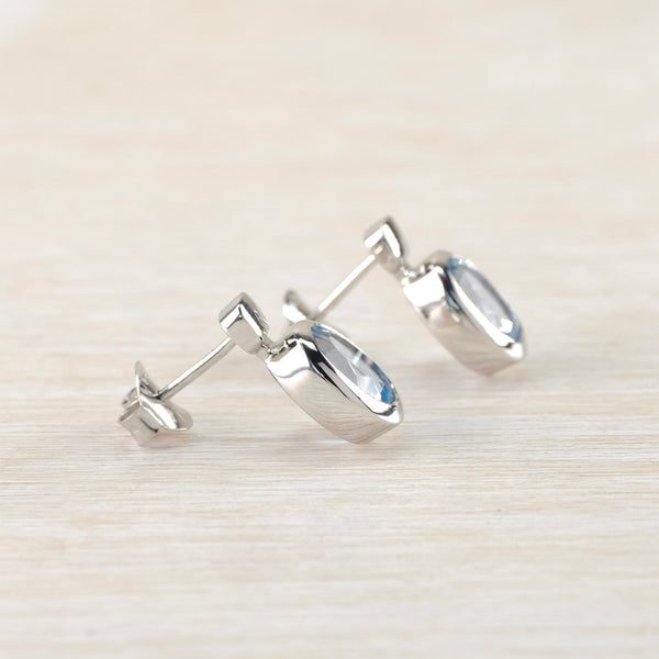 Oval Blue Topaz and Silver Stud Earrings by JB Designs.