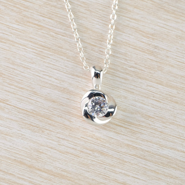 Delicate Cubic Zirconia and Silver Pendant.