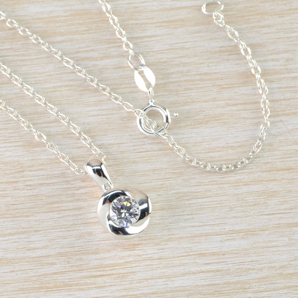 Delicate Cubic Zirconia and Silver Pendant.