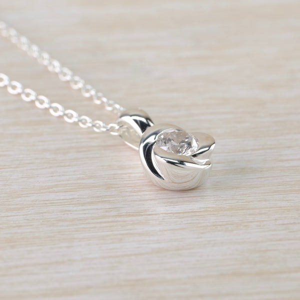 Delicate Cubic Zirconia and Silver Pendant.