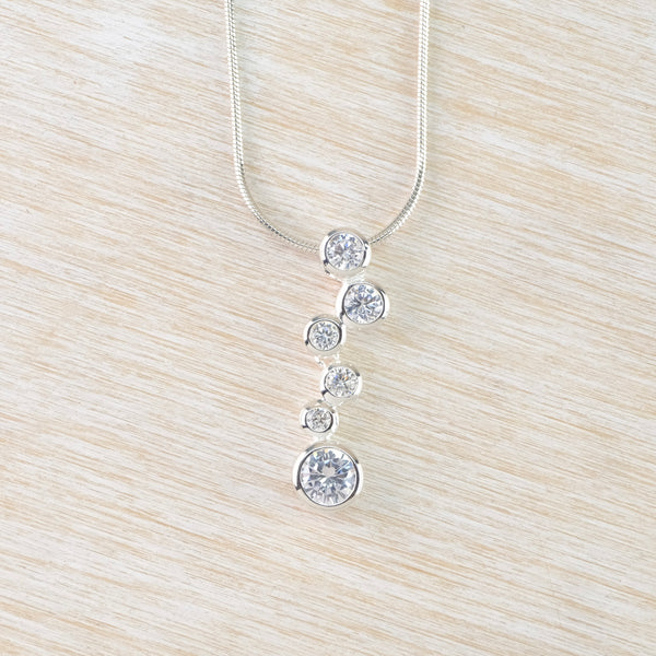 Sterling Silver and Multi CZ Pendant by JB Designs.
