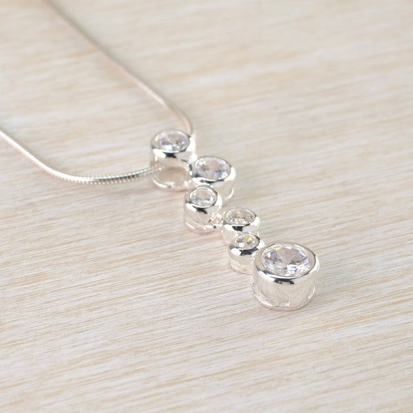Sterling Silver and Multi CZ Pendant by JB Designs.