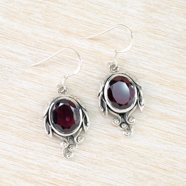 Silver and Faceted Garnet Drop Earrings.
