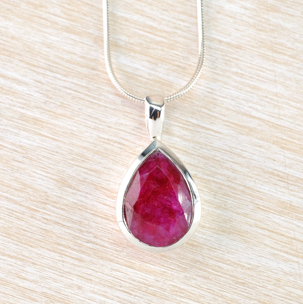 Sterling Silver and Faceted Ruby Quartz Pendant.