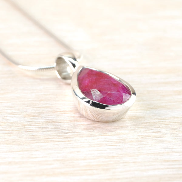 Sterling Silver and Faceted Ruby Quartz Pendant.