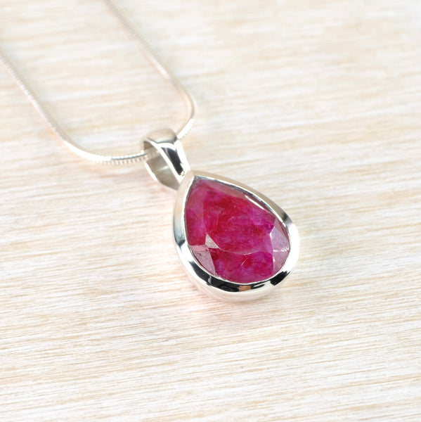 Sterling Silver and Faceted Ruby Quartz Pendant.