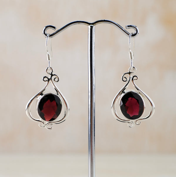 Decorative Silver and Garnet Drop Earrings.