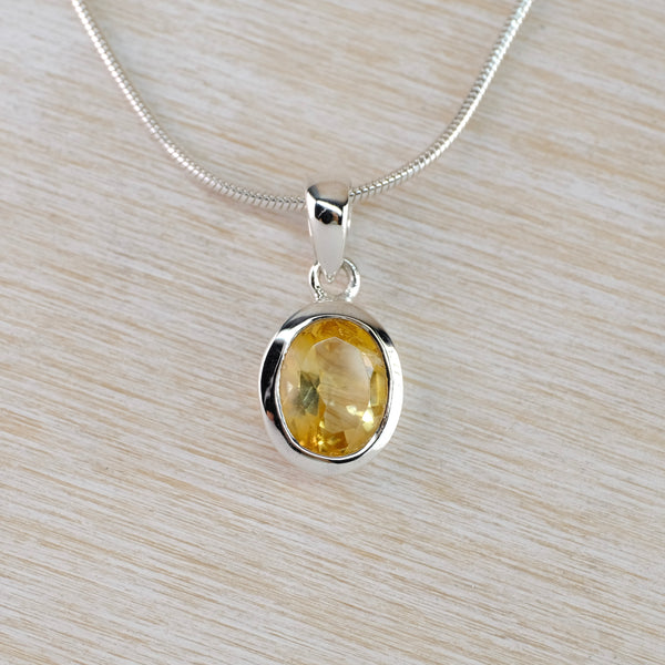 Oval Citrine and Sterling Silver Pendant.