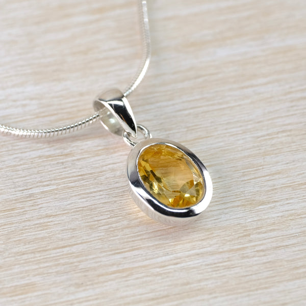 Oval Citrine and Sterling Silver Pendant.
