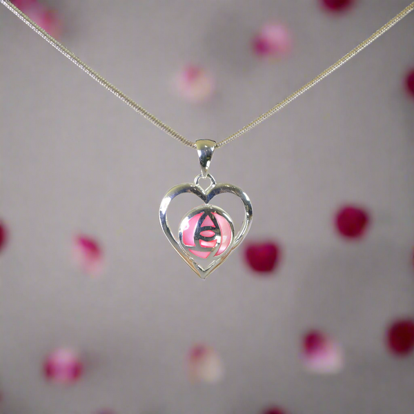 Sterling Silver and Pink Shell Mackintosh Style Pendant.