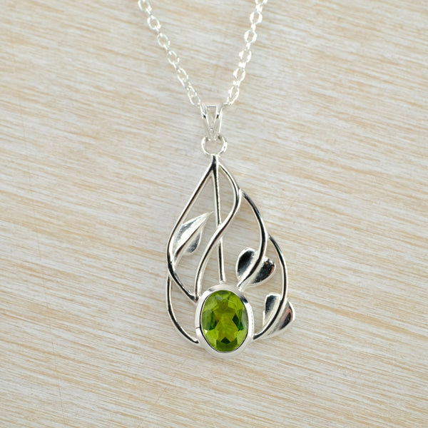 Peridot and Silver Mackintosh Inspired Pendant.