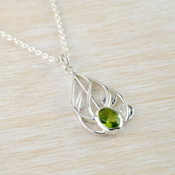 Peridot and Silver Mackintosh Inspired Pendant.