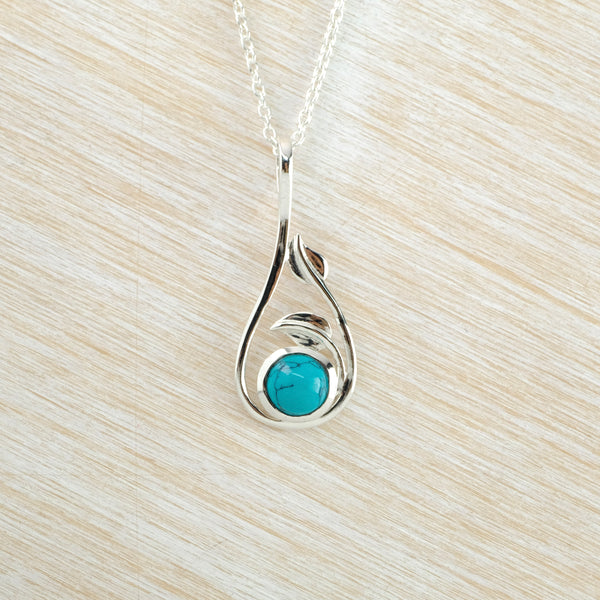Turquoise and Leaves Pendant in Sterling Silver.