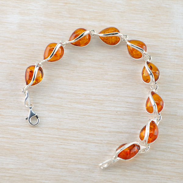 Silver and Tear Drop Cognac Amber Bracelet with Silver Overlay.