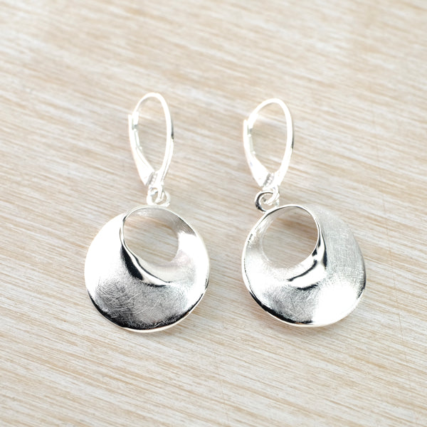 Brushed, Textured Circular Silver Drop Earrings by JB Designs.