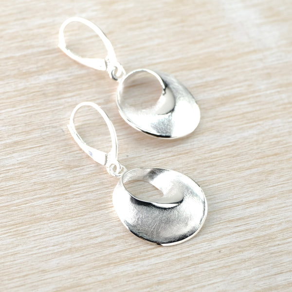 Brushed, Textured Circular Silver Drop Earrings by JB Designs.