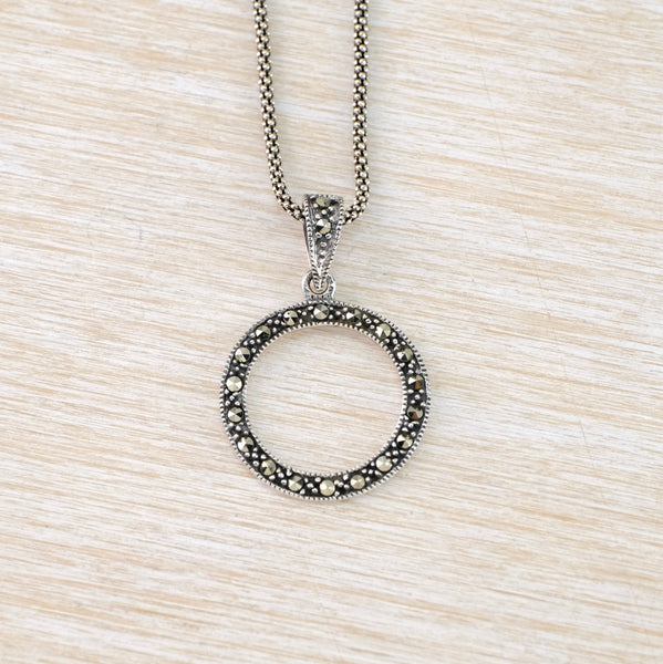 Circular Marcasite and Silver Pendant.