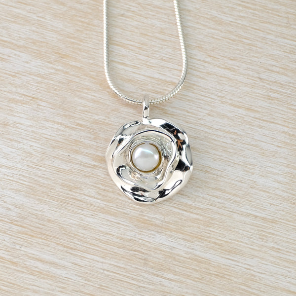Sterling Silver Flower Pendant with Central Pearl.