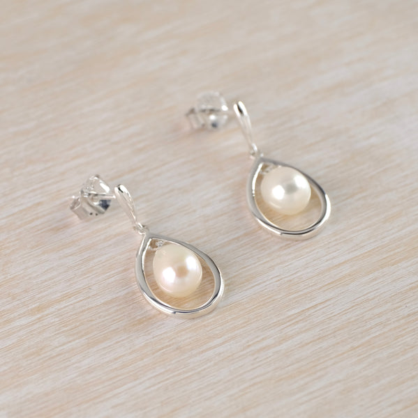 Sterling Silver and Pearl Drop Earrings by JB Designs.