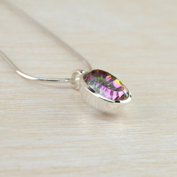 Oval Silver and Mystic Topaz Pendant.