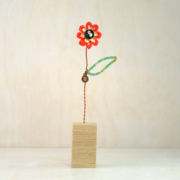 Bead and Button Bloom in Oak Block.