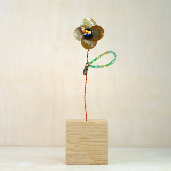 Bead and Button Bloom in Oak Block.