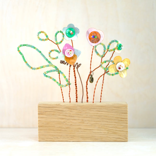 Bead and Button Blooms in Oak Block.