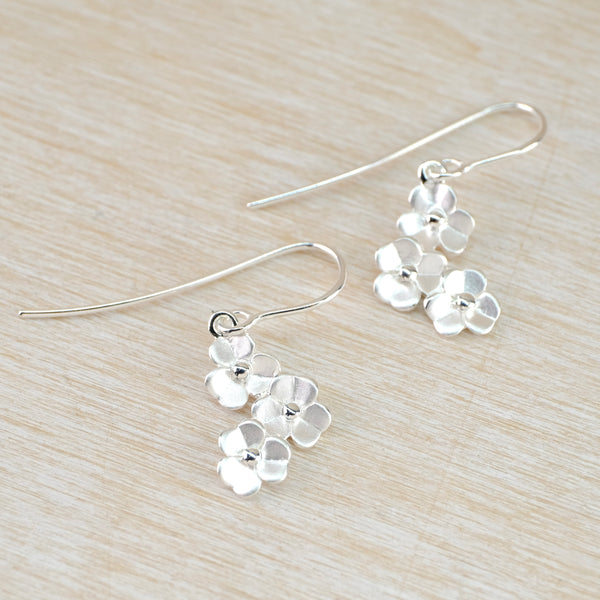 Satin Silver Flower Drop Earrings by JB Designs.