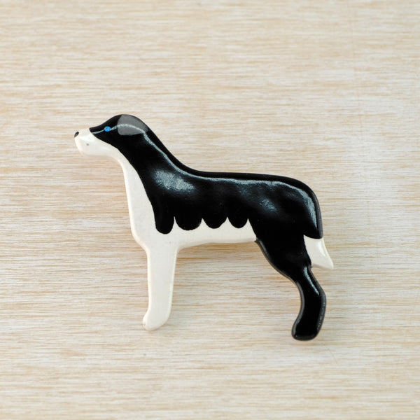 Handmade Black and White Ceramic Dog Brooch.
