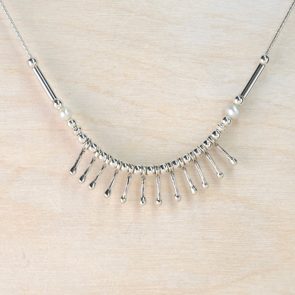 Silver and Pearl Droplet Necklace.