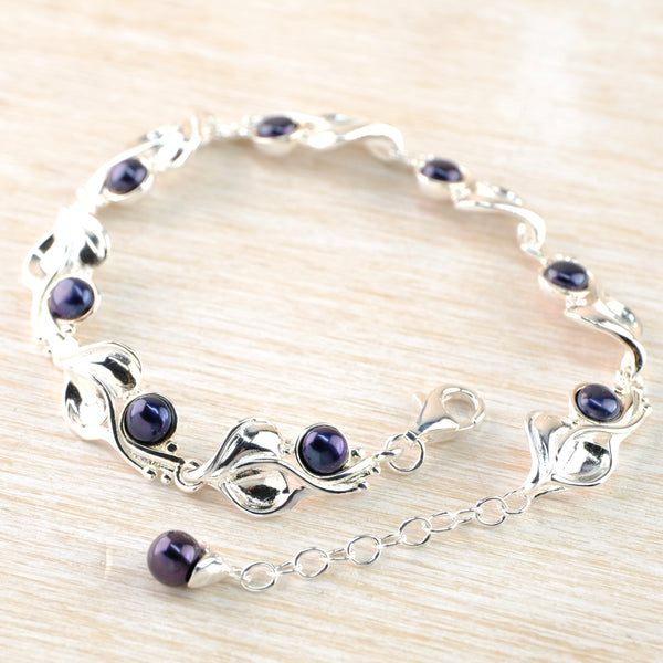 Sterling Silver and Black Pearl Linked Bracelet.