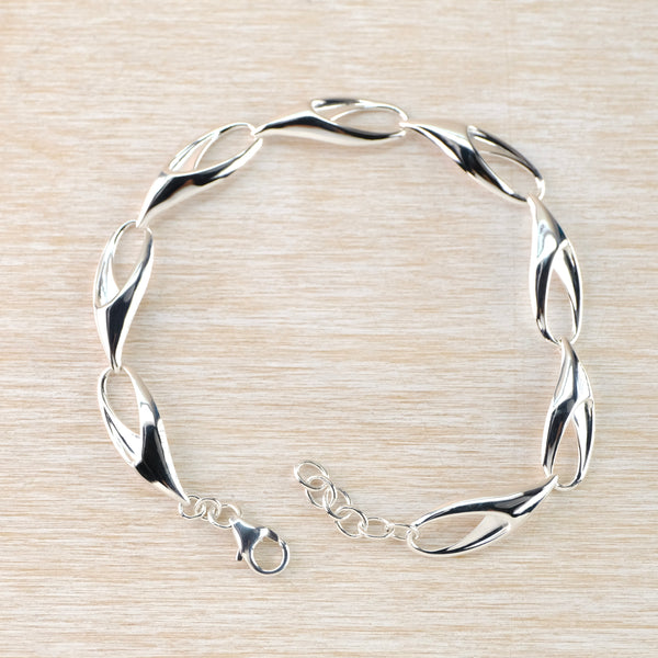 Polished Silver Linked Bracelet by JB Designs.