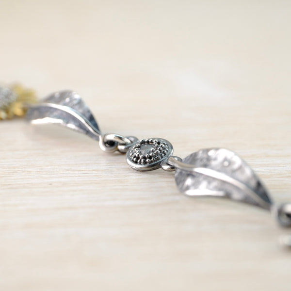 Handmade Silver Sunflower Bracelet by Sheena McMaster.