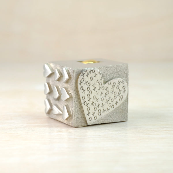A Solid Pewter 'Love' Cube