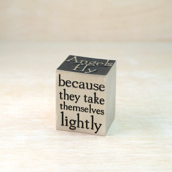A Solid Pewter 'Angels Fly' Cube