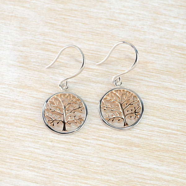  Round Silver earrings with tree design  and gold-plating on the tree.