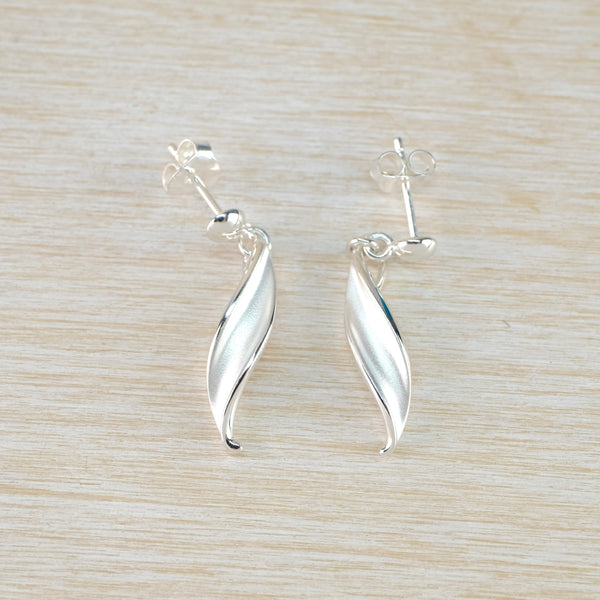 Satin and Shiny Silver Twist Drop Earrings by JB Designs.