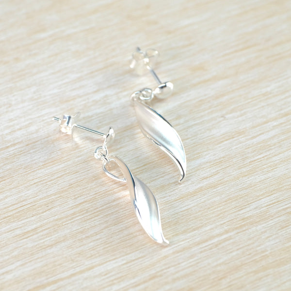 Satin and Shiny Silver Twist Drop Earrings by JB Designs.