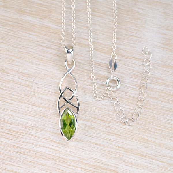 Celtic Design Silver and Peridot Pendant.