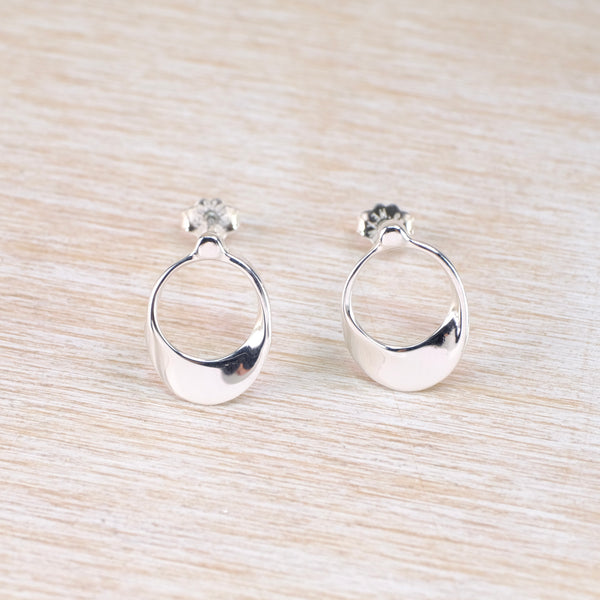 Pair of silver stud earrings with a oval hop design