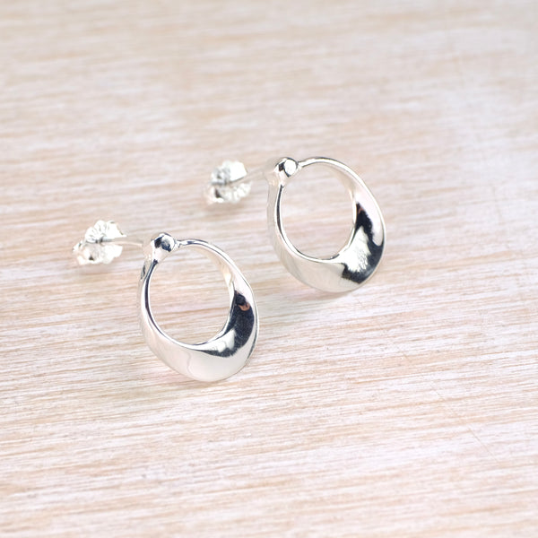 Oval Polished Silver Stud Earrings by JB Designs.
