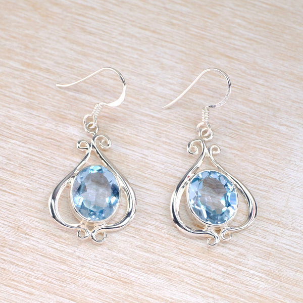 Ornate Silver and Blue Topaz Drop Earrings.