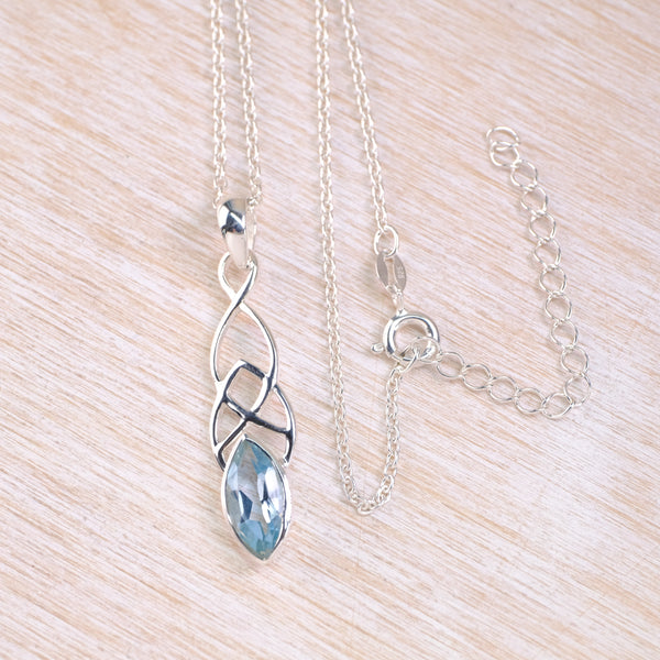 Celtic Knot Design Blue Topaz and Silver Pendant.