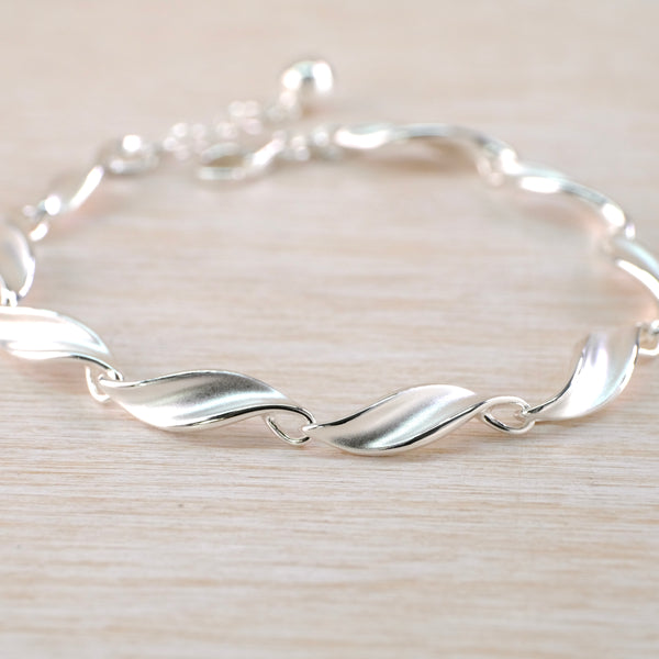 Silver Bracelet with Leaf Twist Links by JB Designs.