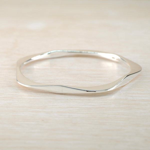 Curves Sterling Silver Bangle.