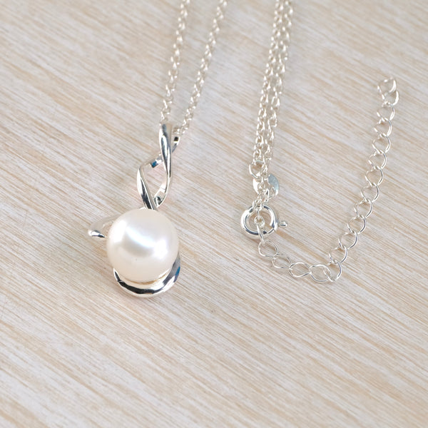 Double Twist Sterling Silver Pendant with a Single White Pearl.