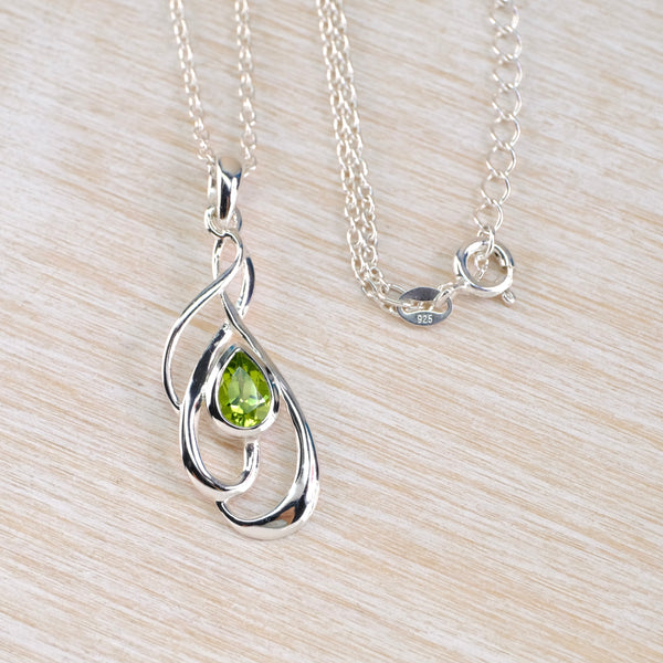 Silver Swirl and Peridot Pendant.