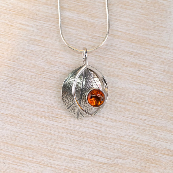 Sterling Silver and Amber Double Leaf Design Pendant Necklace.