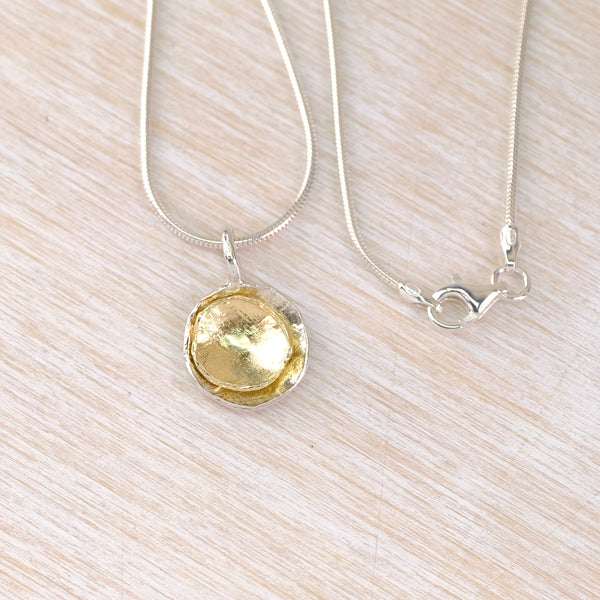 Round Silver and Gold Plated Pendant by JB Designs.