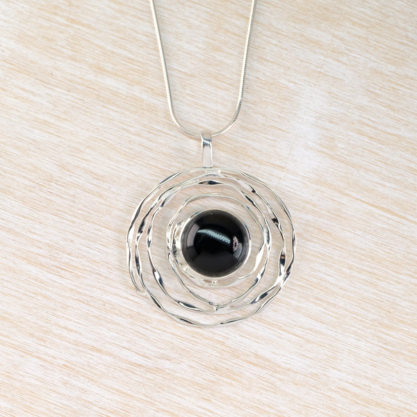 Silver Swirl and Black Onyx Pendant.